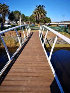 Timber pergolas, decks & handrails by Custom Decks & Walkways